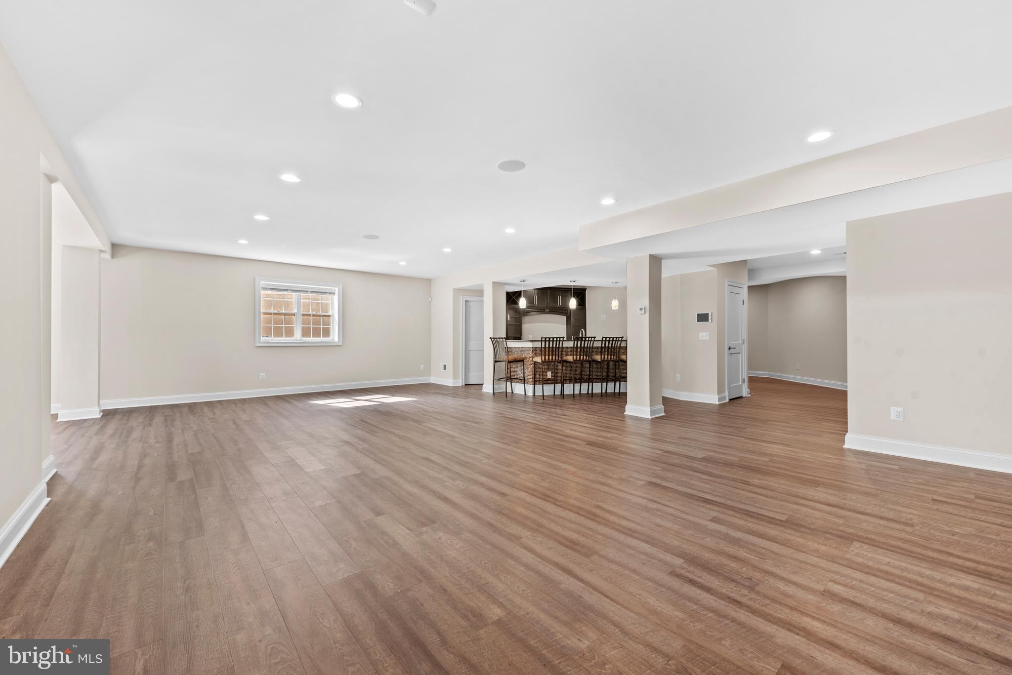 7003 Churchill Road McLean, VA 22101 - Photo 62 of 76 a view of empty room with kitchen and sink