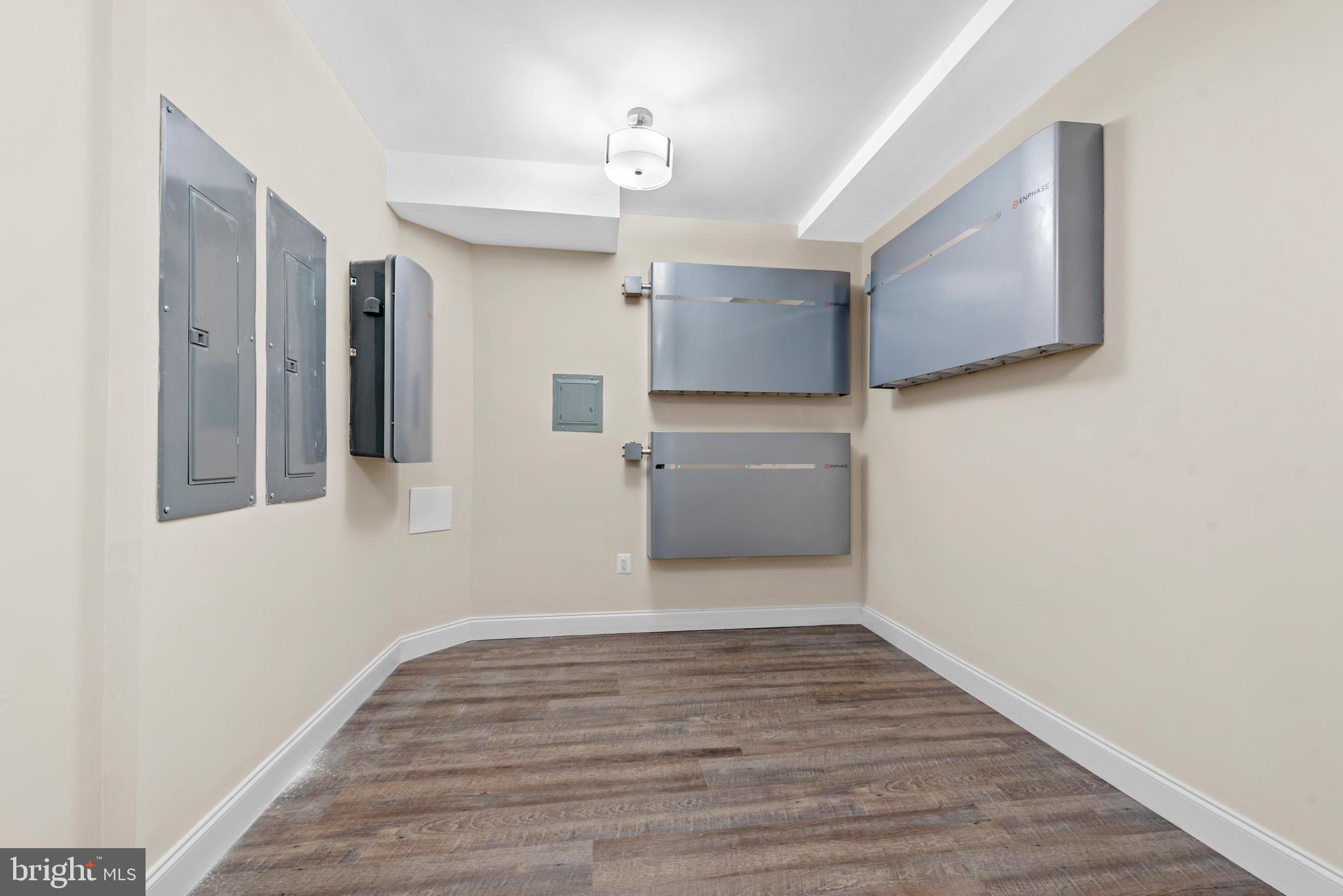 7003 Churchill Road McLean, VA 22101 - Photo 69 of 76 a view of empty room with wooden floor and fan