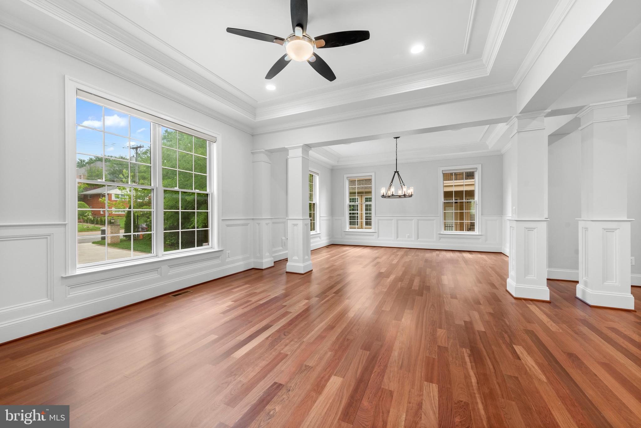 7003 Churchill Road McLean, VA 22101 - Photo 7 of 76 a view of an empty room with wooden floor and a window
