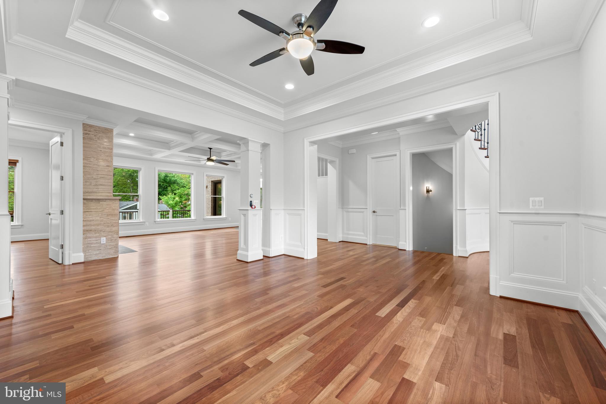7003 Churchill Road McLean, VA 22101 - Photo 8 of 76 a view of an empty room with window and wooden floor
