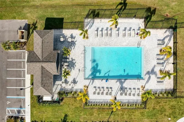 a view of a swimming pool with an ocean view