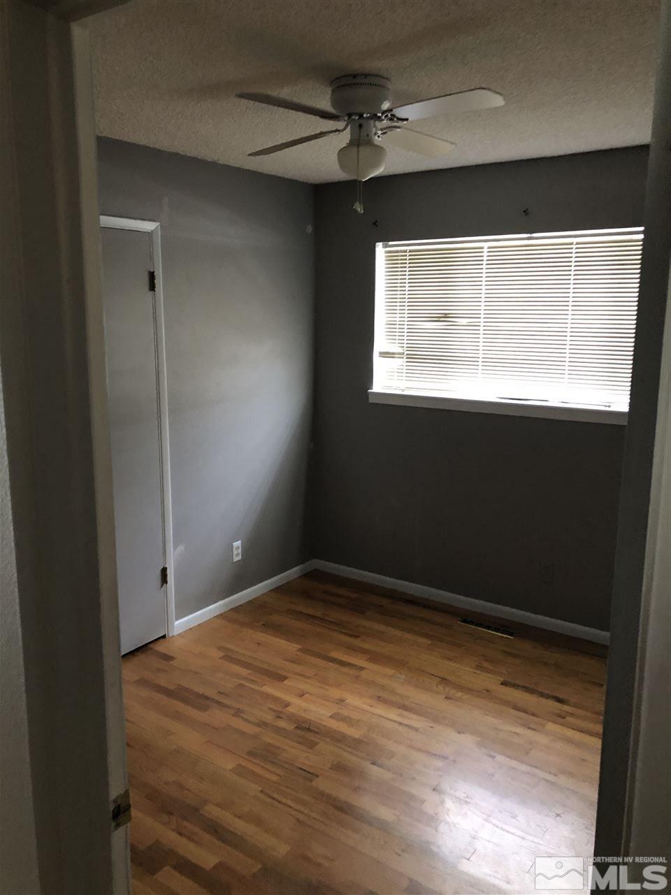 1045 Beldon Way Reno, NV 89503 - Photo 12 of 23 a view of an empty room with a window