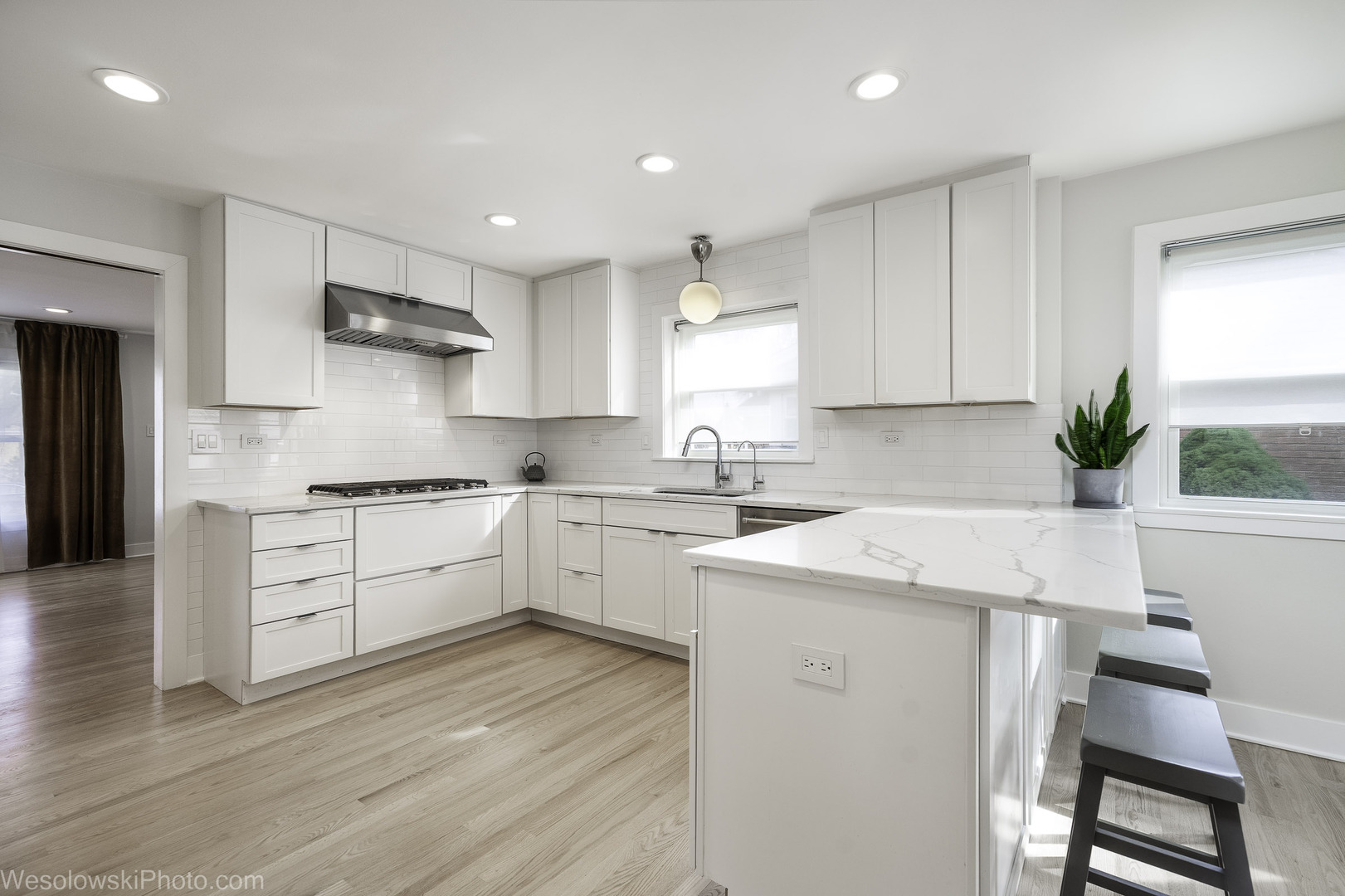 708 North Russel Street Mount Prospect, IL 60056 - Photo 6 of 30 a kitchen with white cabinets stove and white stainless steel appliances