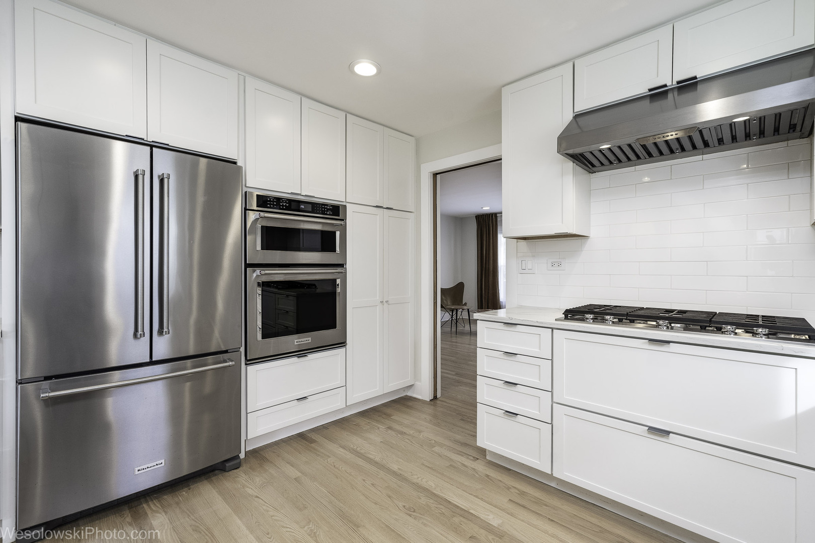 708 North Russel Street Mount Prospect, IL 60056 - Photo 9 of 30 a kitchen with stainless steel appliances a refrigerator and white cabinets
