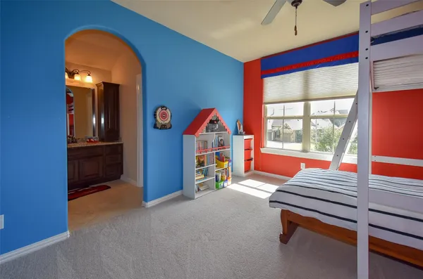 a room with furniture and air hockey table