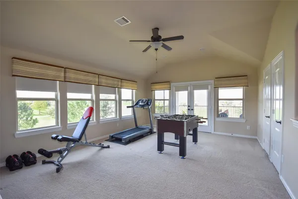 a view of a livingroom with furniture and windows