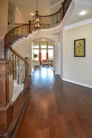 a view of gallery with wooden floor
