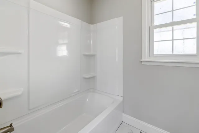 a close up of a bathtub in a bathroom