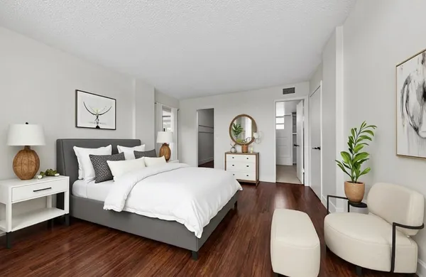 a view of an empty room and wooden floor