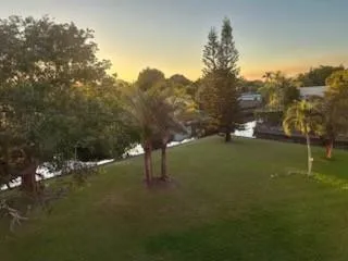 a view of yard with swimming pool