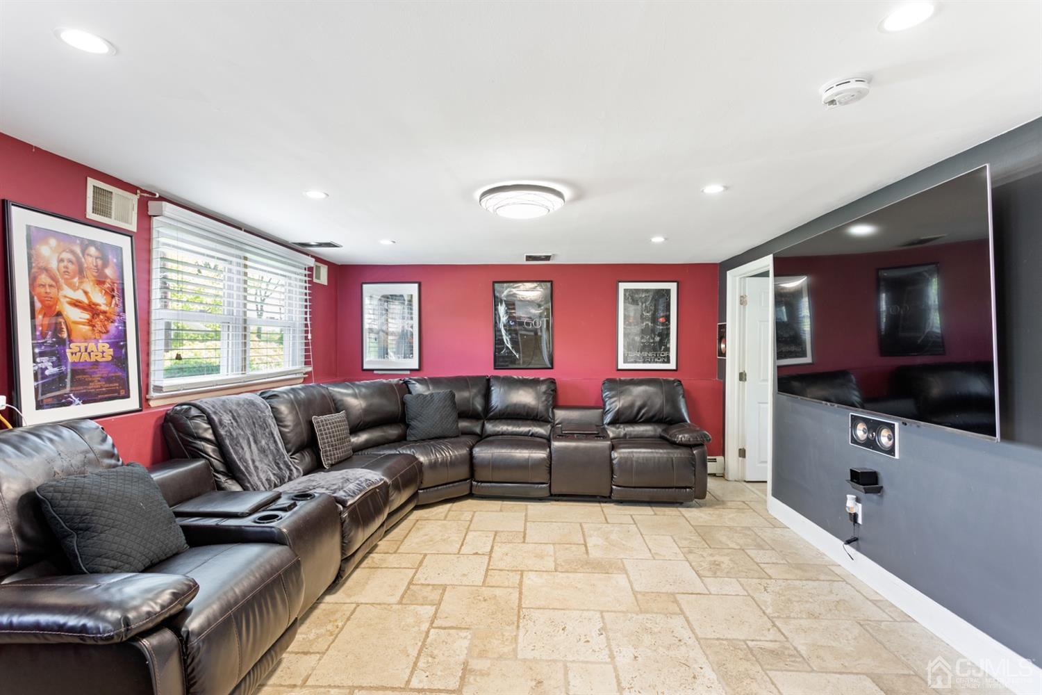9 Larchmont Road Edison, NJ 08837 - Photo 14 of 31 a living room with furniture and a flat screen tv