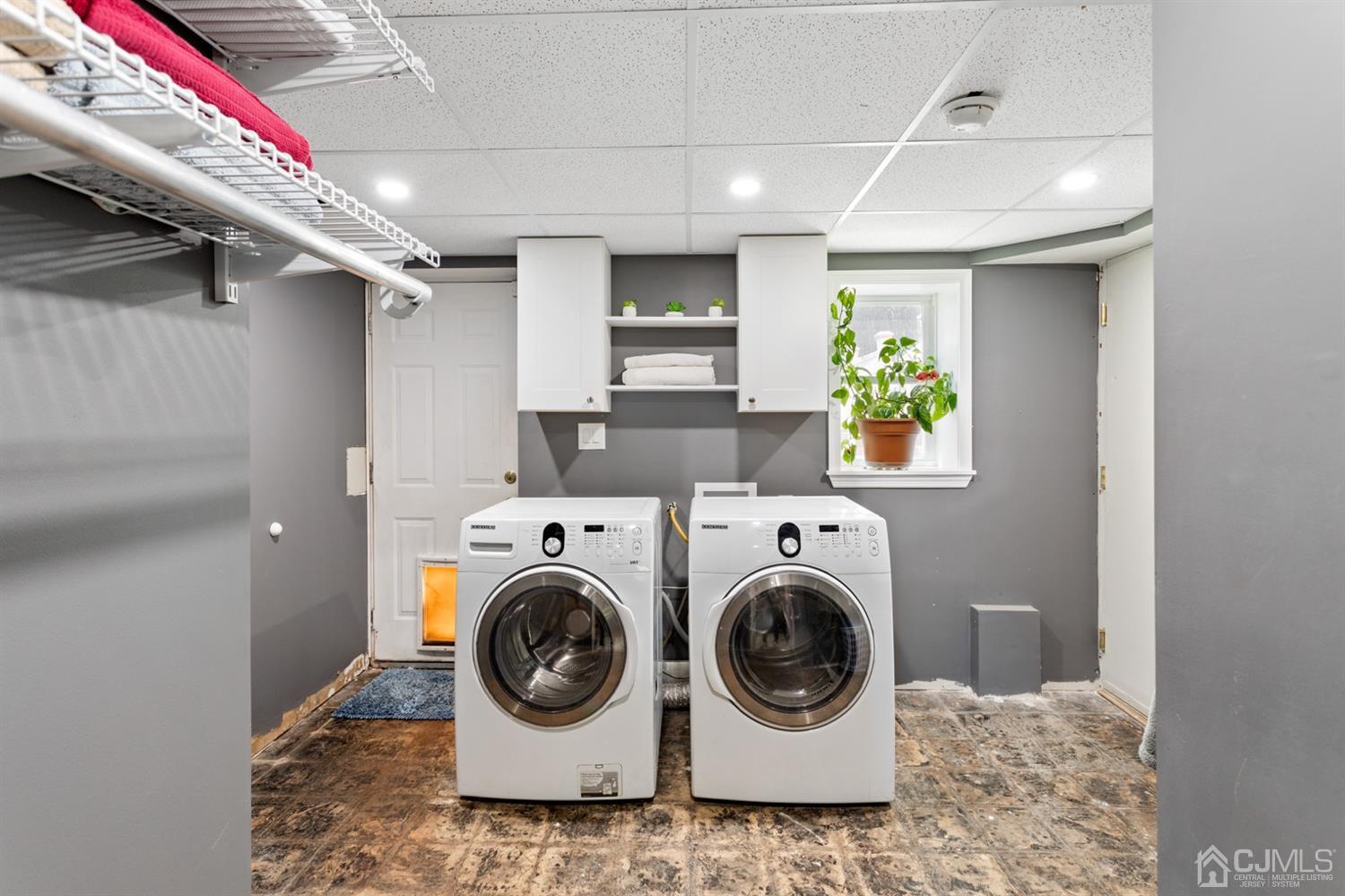 9 Larchmont Road Edison, NJ 08837 - Photo 30 of 31 a utility room with dryer and washer