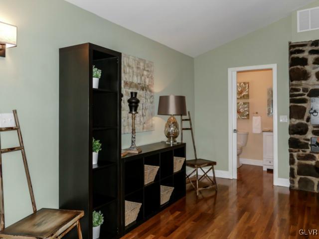 3085 Bursonville Road Riegelsville, PA 18077 - Photo 13 of 31 a view of a workspace with furniture and wooden floor