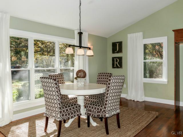 3085 Bursonville Road Riegelsville, PA 18077 - Photo 14 of 31 a dining room with furniture a chandelier and wooden floor