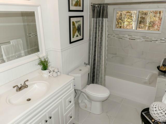 3085 Bursonville Road Riegelsville, PA 18077 - Photo 24 of 31 a bathroom with a sink a toilet and shower