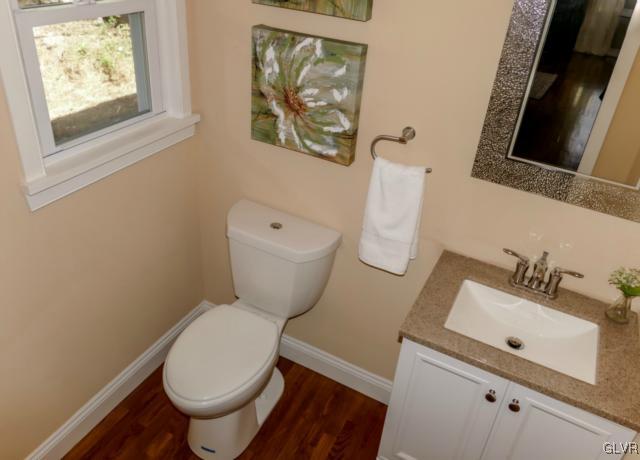 3085 Bursonville Road Riegelsville, PA 18077 - Photo 25 of 31 a white toilet sitting next to a bathroom sink
