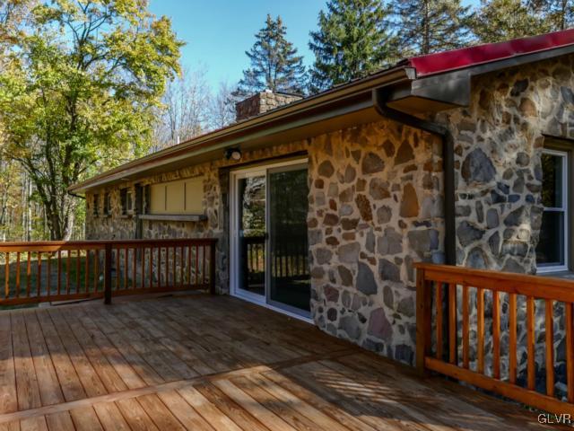 3085 Bursonville Road Riegelsville, PA 18077 - Photo 28 of 31 a view of wooden house with a deck