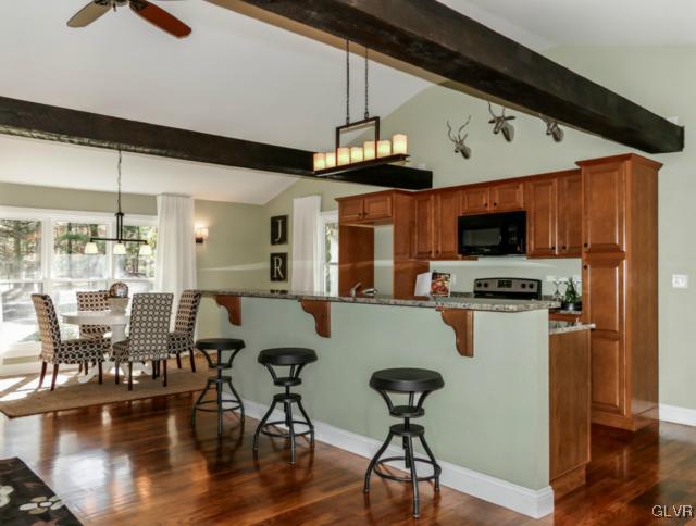 3085 Bursonville Road Riegelsville, PA 18077 - Photo 6 of 31 a view of a dining room with furniture wooden floor and a chandelier