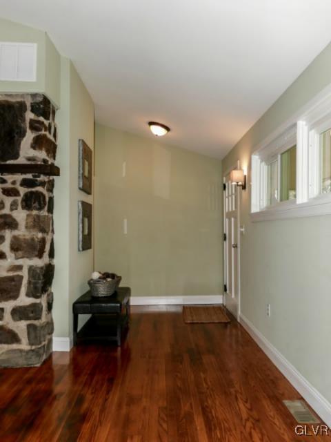 3085 Bursonville Road Riegelsville, PA 18077 - Photo 8 of 31 a view of a livingroom with wooden floor and lounge chairs