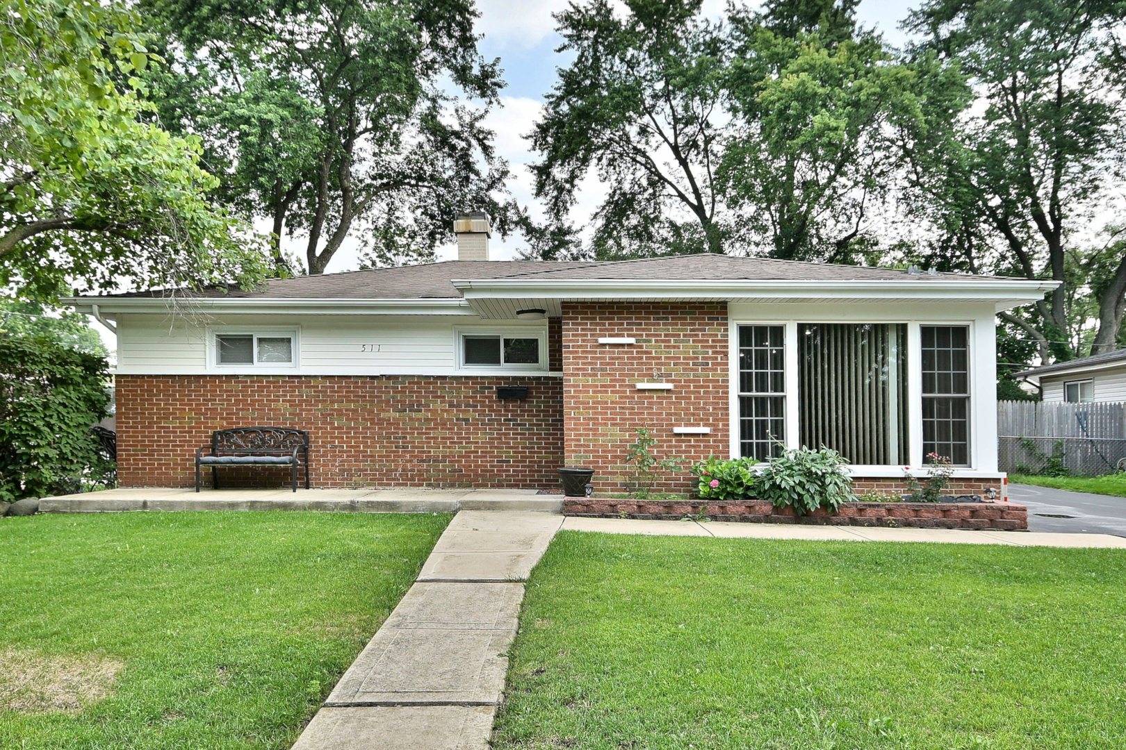a front view of house with yard