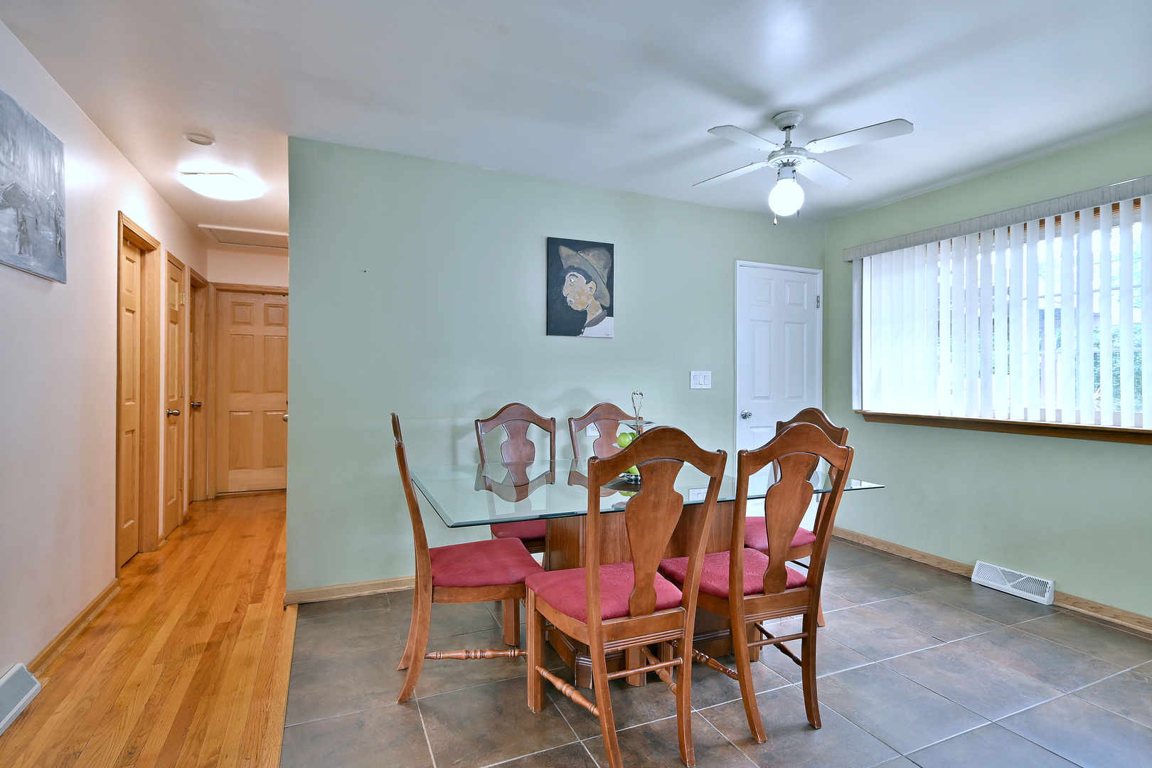 511 West Byron Avenue Addison, IL 60101 - Photo 12 of 31 a view of a dining room with furniture and chandelier