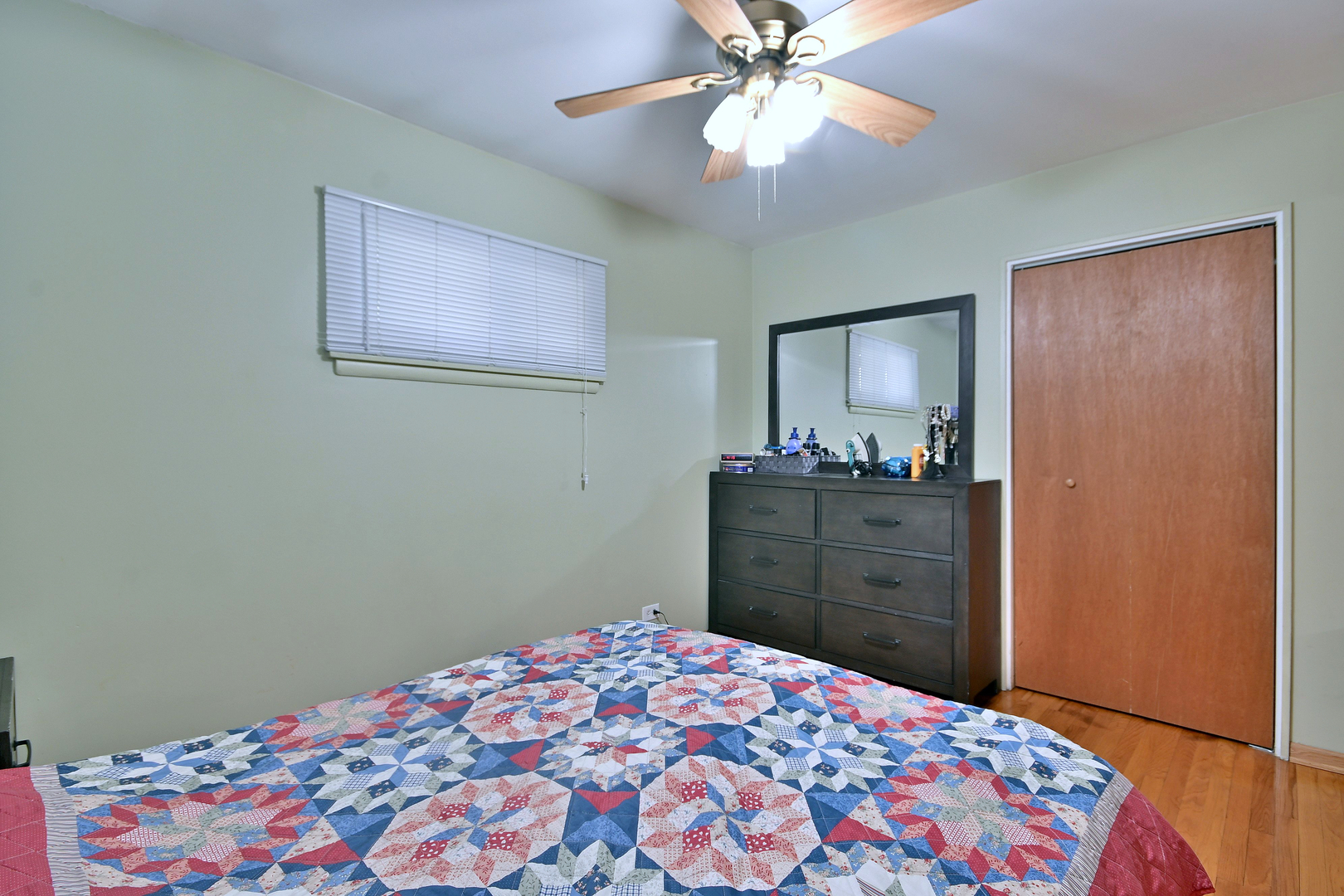 511 West Byron Avenue Addison, IL 60101 - Photo 14 of 31 a bedroom with a bed and a dresser