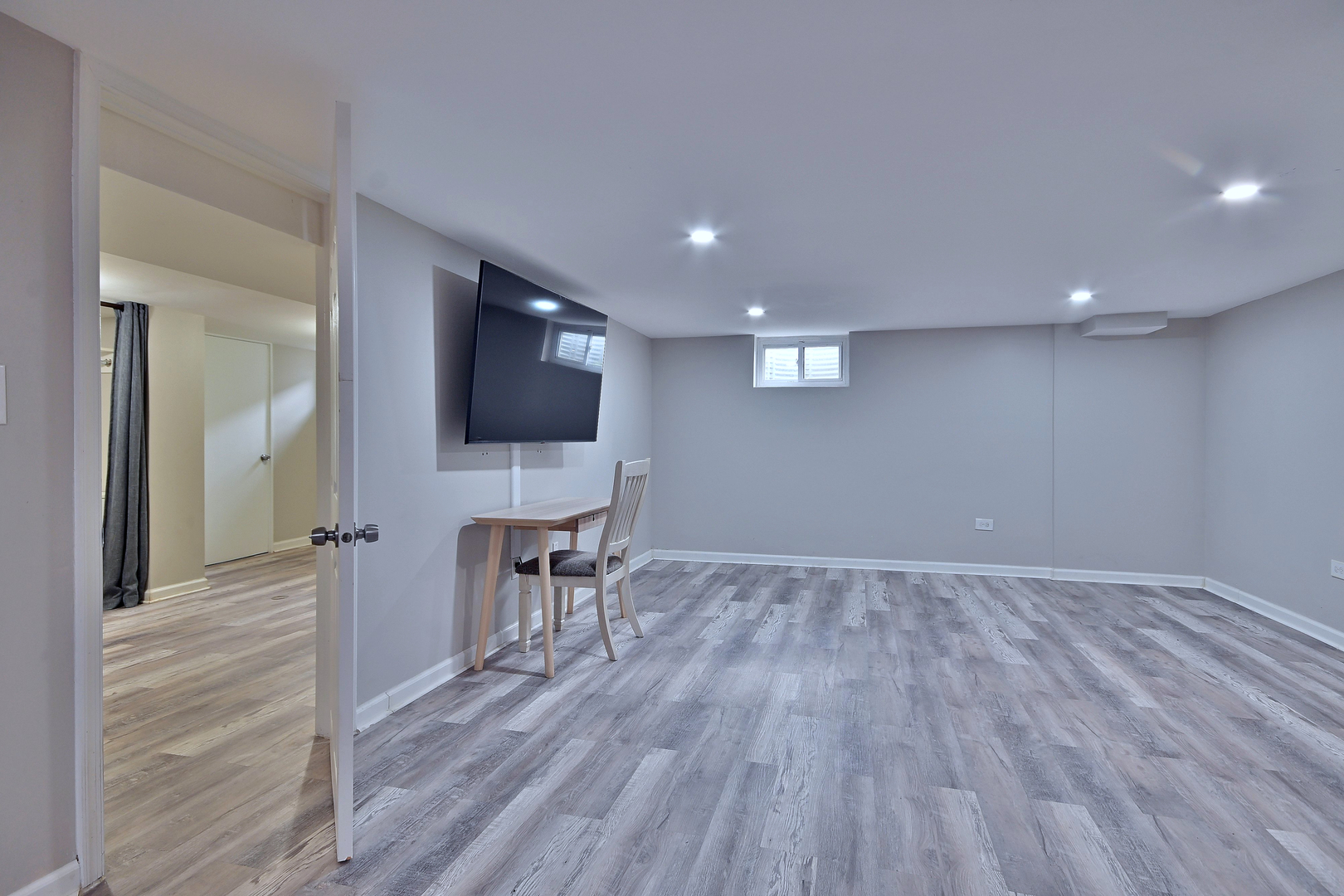 511 West Byron Avenue Addison, IL 60101 - Photo 19 of 31 a view of a livingroom with furniture and wooden floor