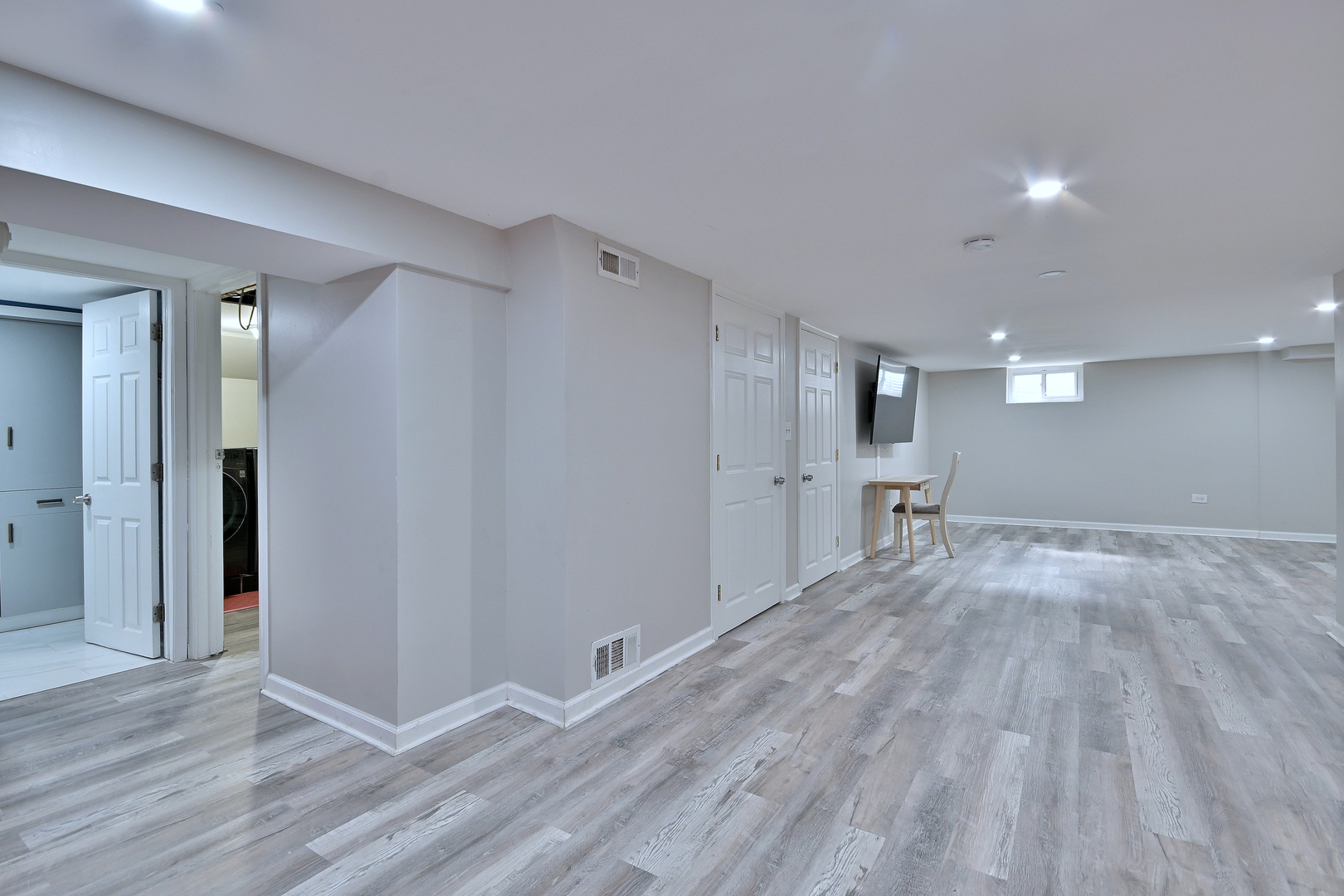 511 West Byron Avenue Addison, IL 60101 - Photo 23 of 31 a view of a big room with wooden floor and windows
