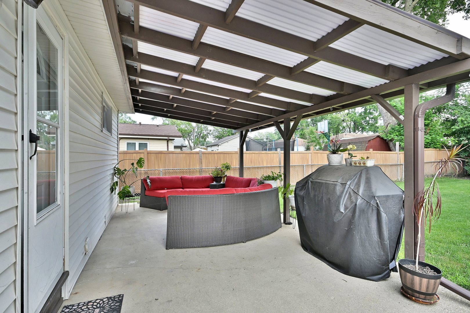 511 West Byron Avenue Addison, IL 60101 - Photo 27 of 31 a view of a patio with table and chairs
