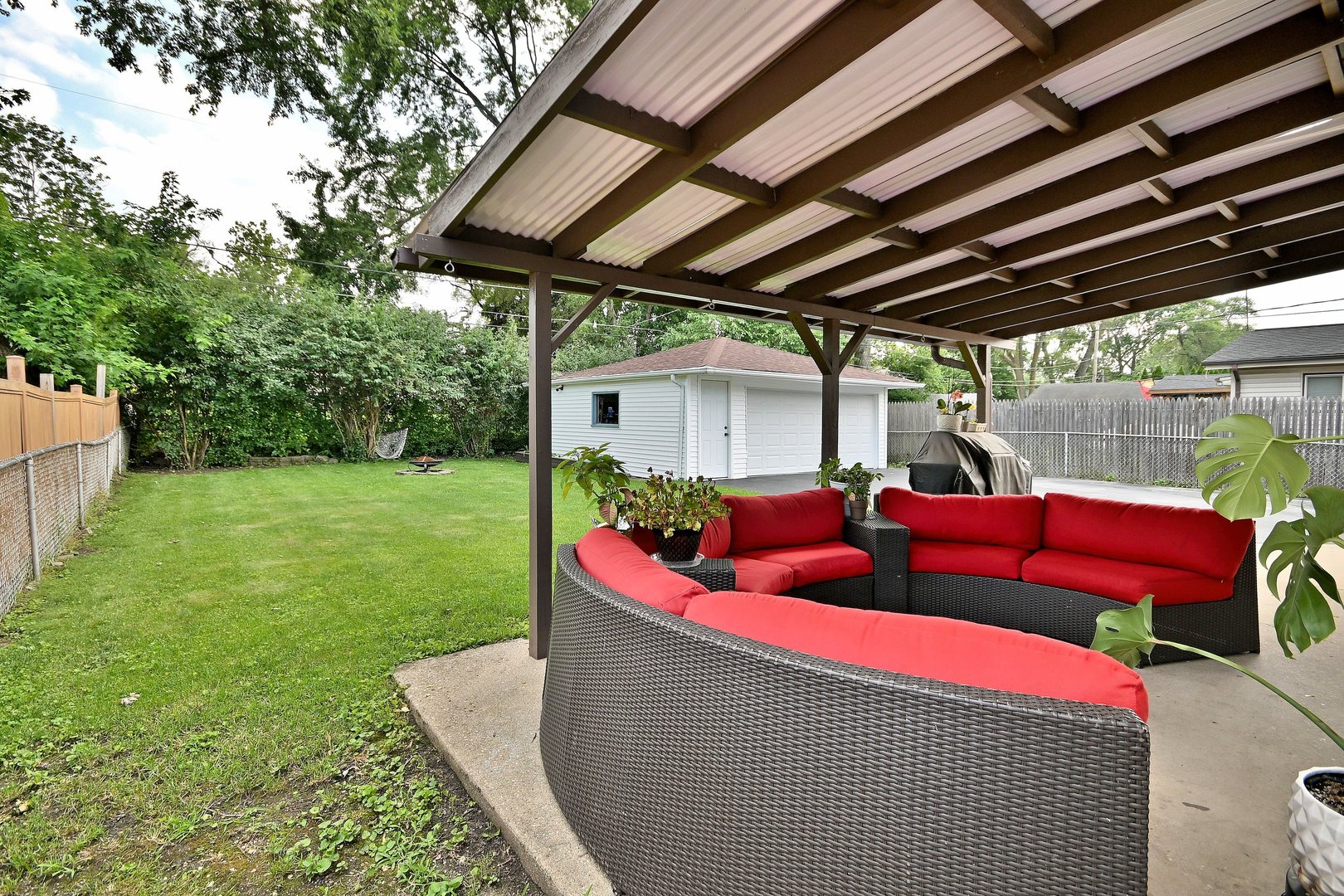 511 West Byron Avenue Addison, IL 60101 - Photo 29 of 31 a couch sitting in the middle of a yard