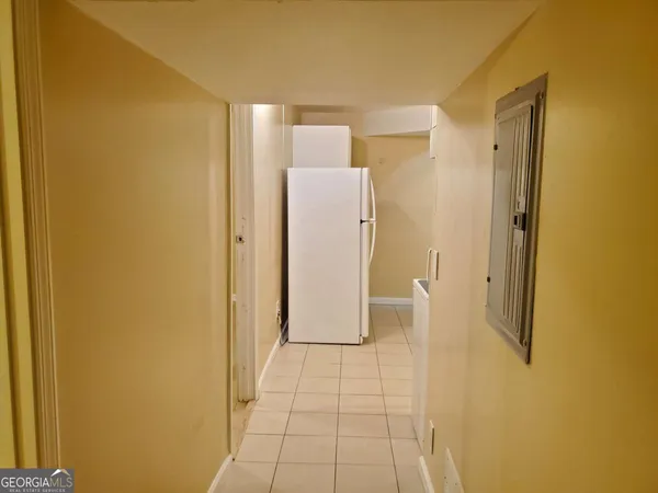 a bathroom with a shower and a sink