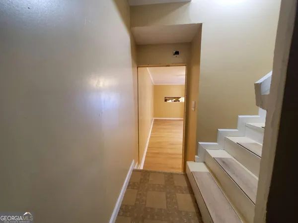 a bathroom with a sink and mirror