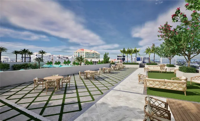 a view of a backyard with plants and a patio