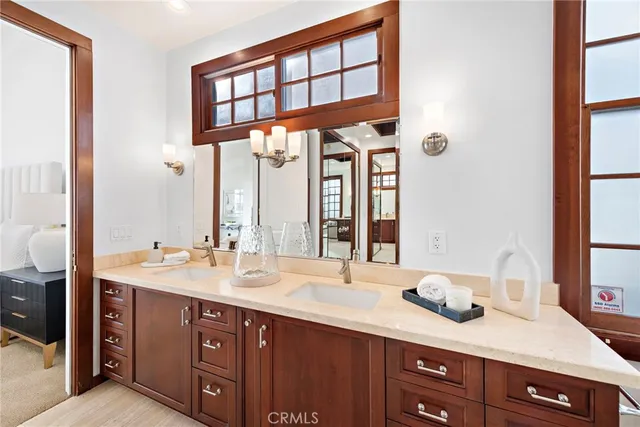 a spacious bedroom with a bed and a couch