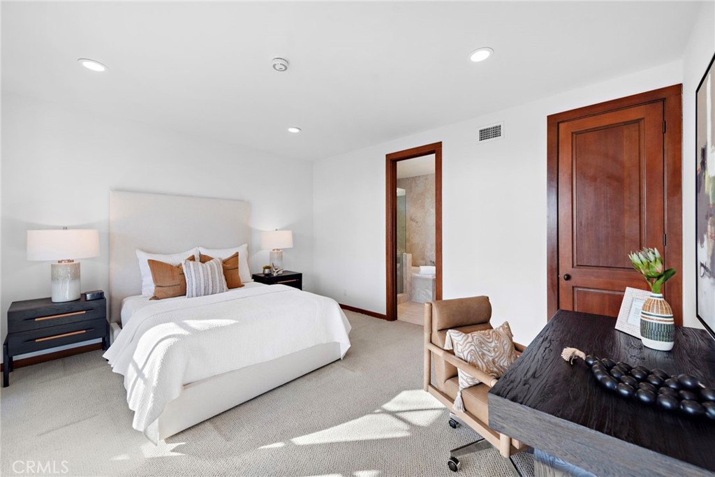 521 Kings Road Newport Beach, CA 92663 - Photo 34 of 48 a bedroom with a bed and a couch