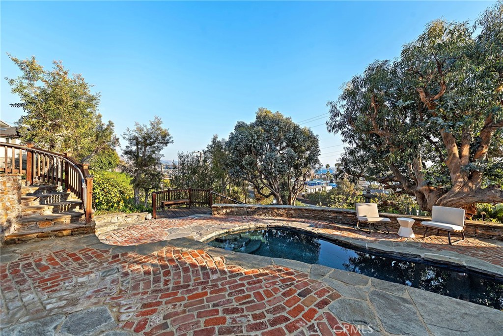 521 Kings Road Newport Beach, CA 92663 - Photo 39 of 48 a view of a swimming pool with wooden fence