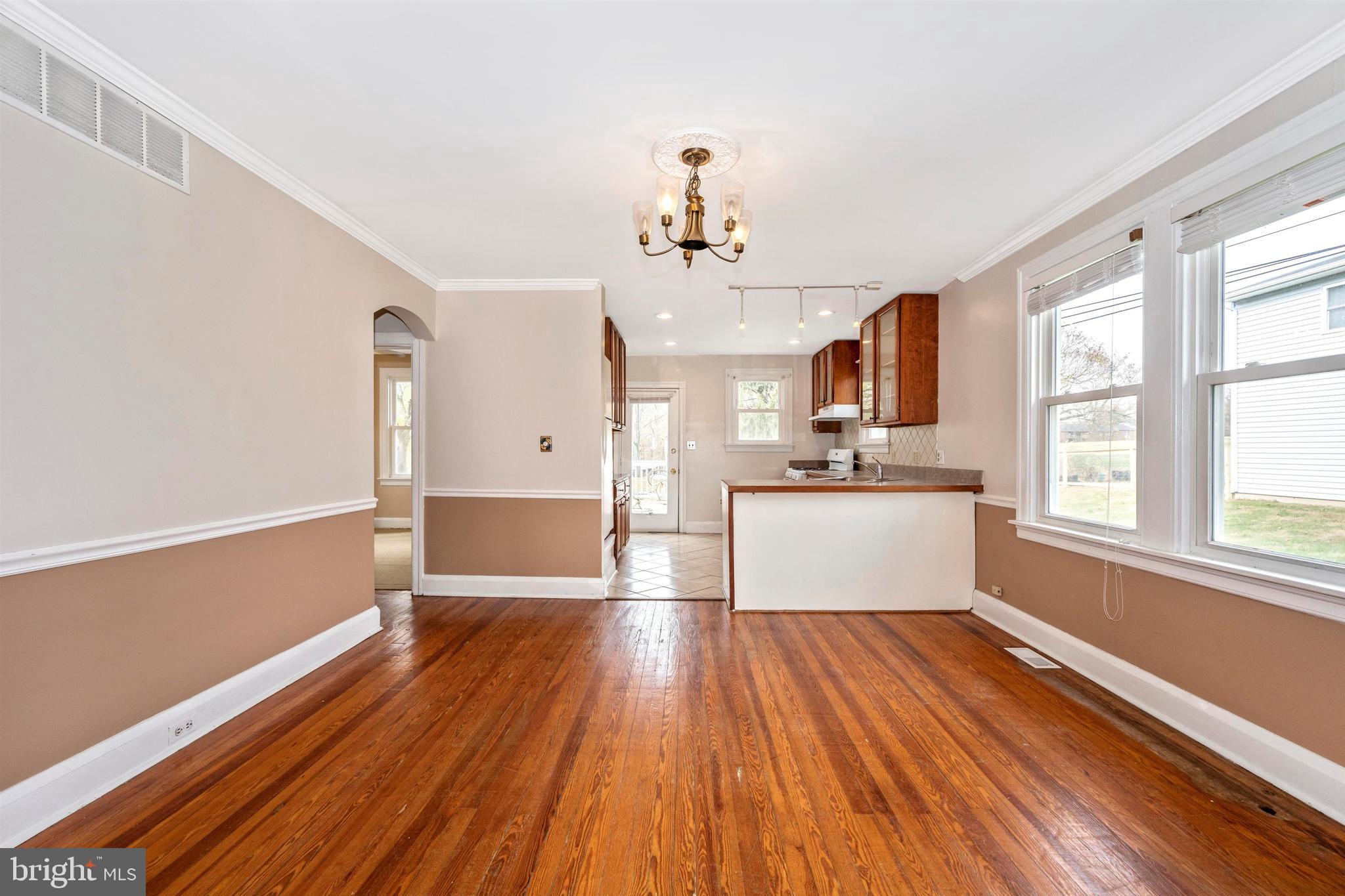 3316 Chapman Road Randallstown, MD 21133 - Photo 11 of 60 Open-concept Dining Looking Into Kitchen