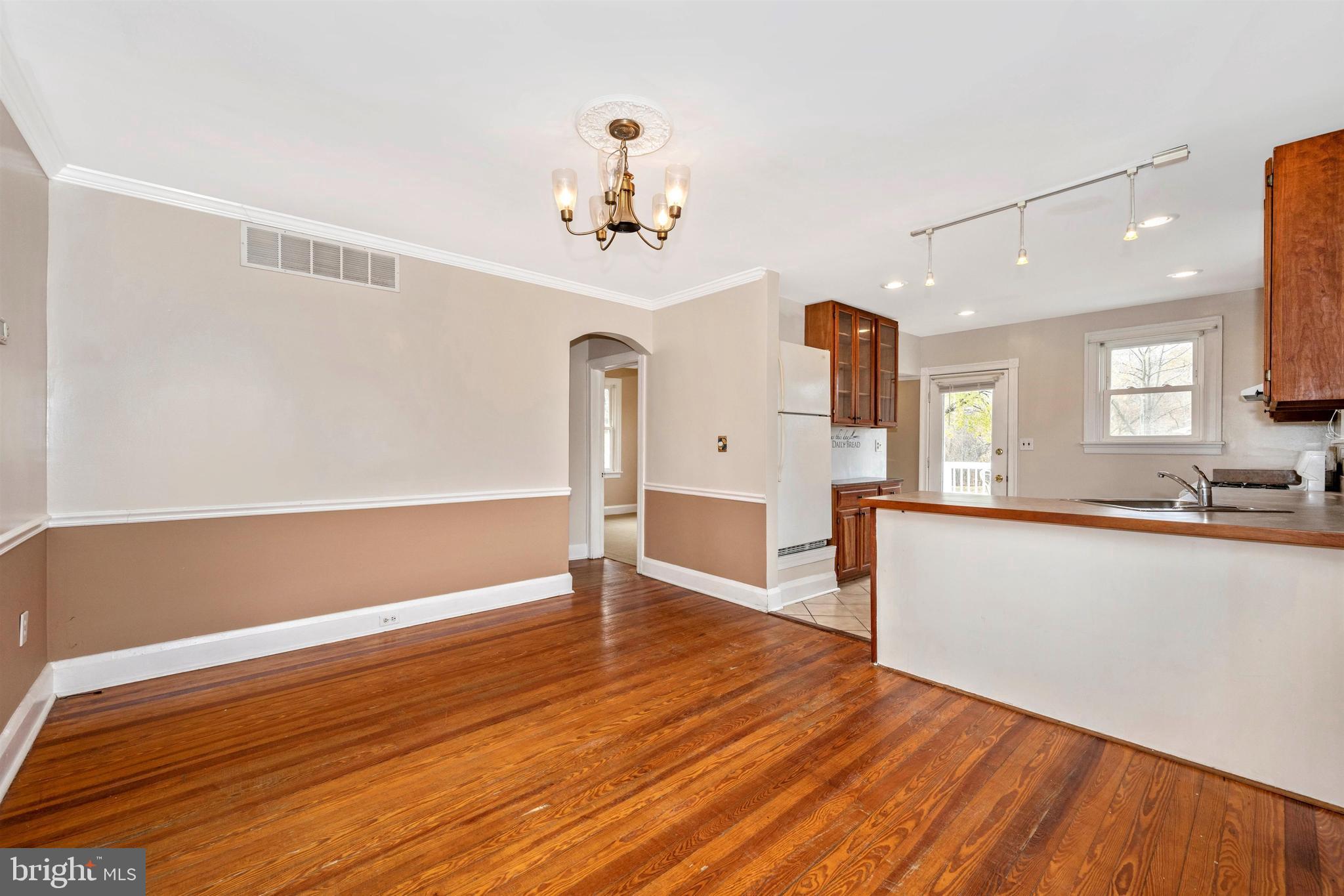 3316 Chapman Road Randallstown, MD 21133 - Photo 12 of 60 Dining Room Looking Into Hallway to Bedrooms