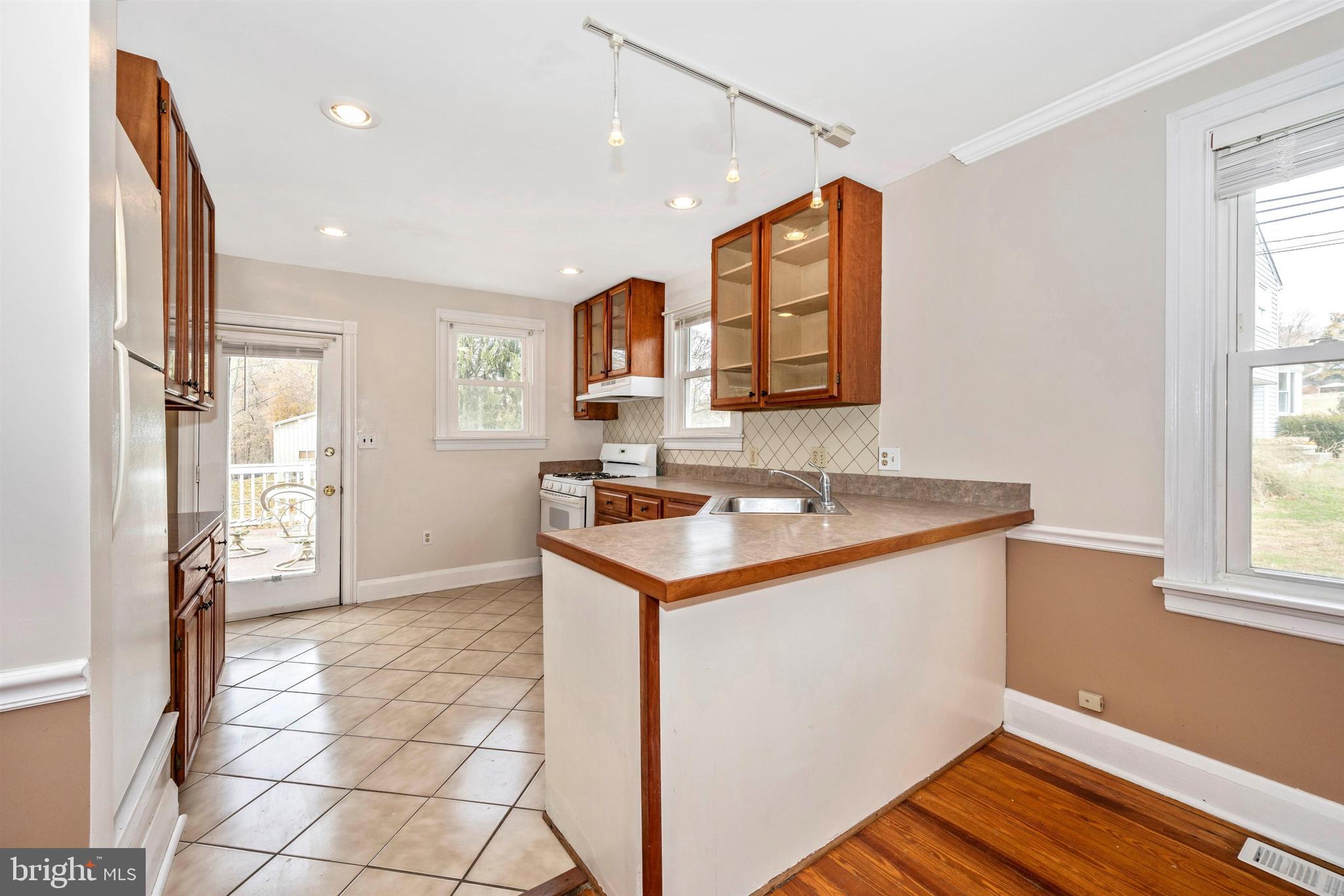 3316 Chapman Road Randallstown, MD 21133 - Photo 13 of 60 Light Bright Kitchen with Breakfast Bar