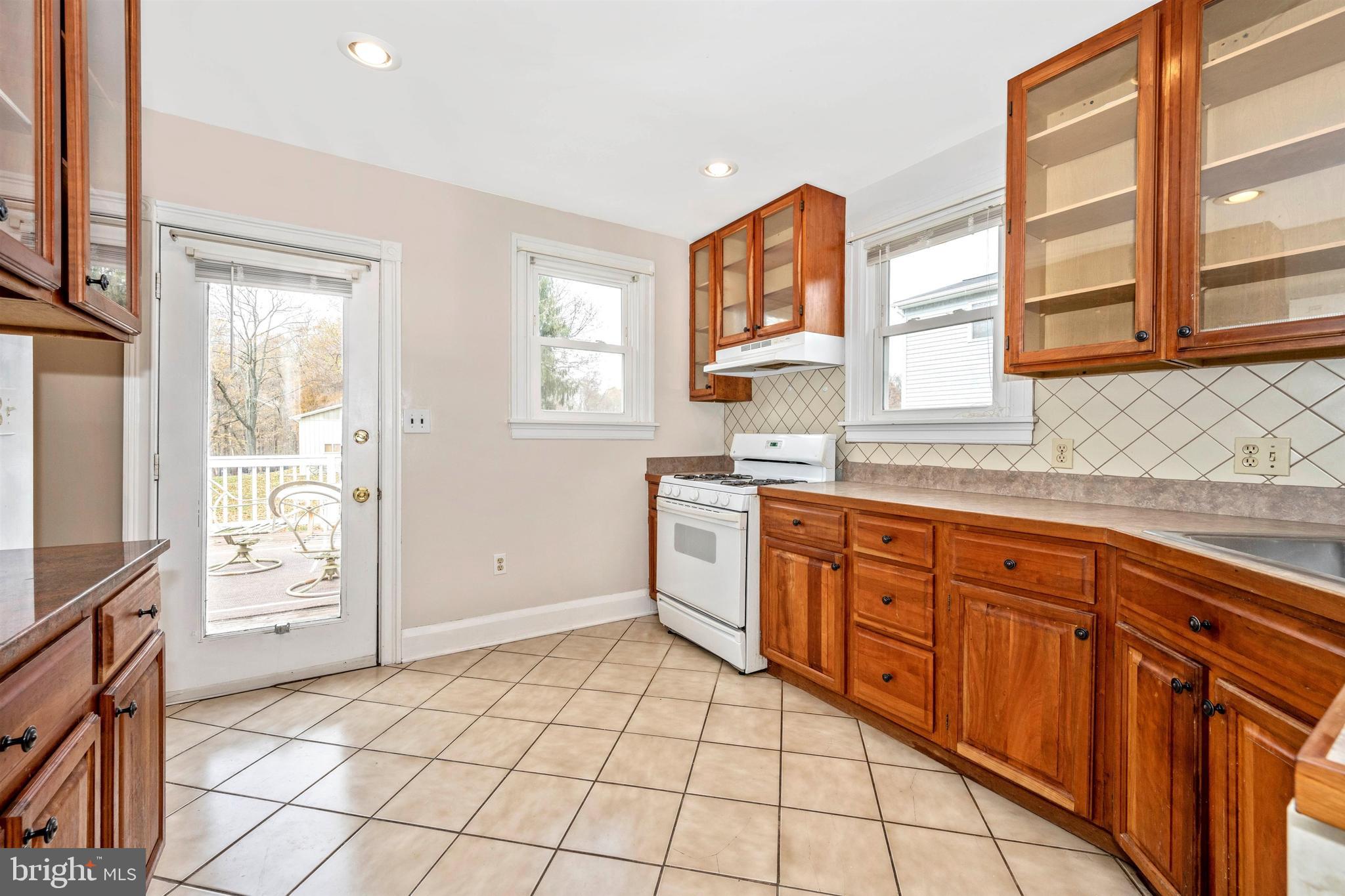 3316 Chapman Road Randallstown, MD 21133 - Photo 14 of 60 Kitchen Door Open to Deck
