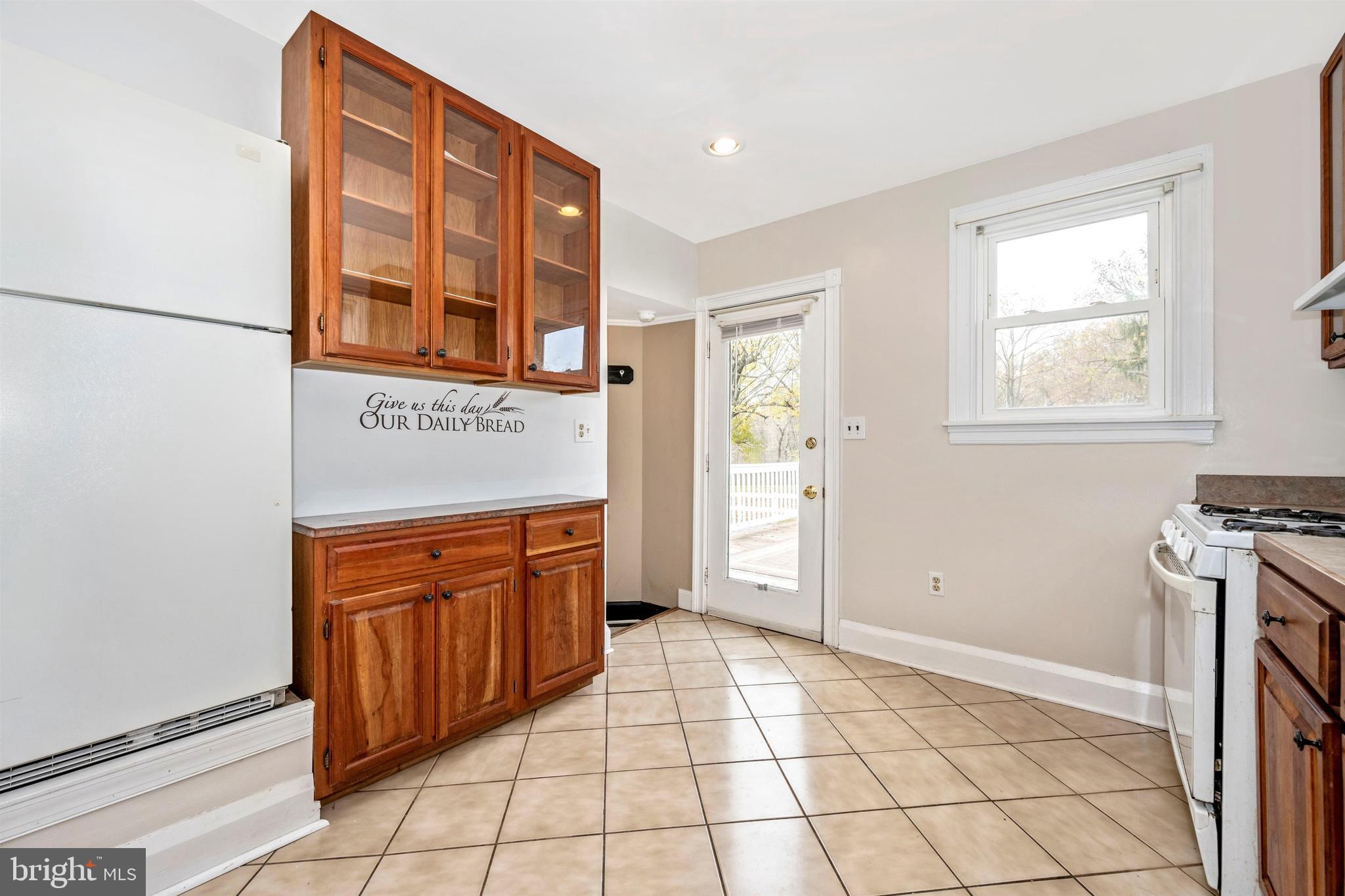 3316 Chapman Road Randallstown, MD 21133 - Photo 15 of 60 Bright Kitchen with Ceramic Floor