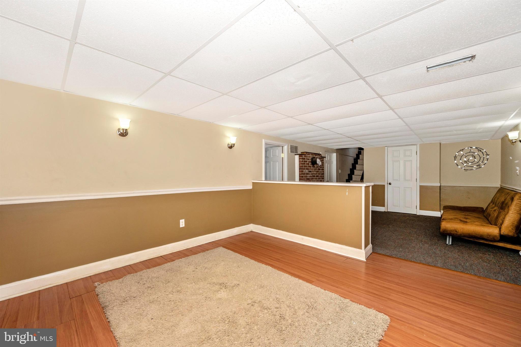 3316 Chapman Road Randallstown, MD 21133 - Photo 25 of 60 Lower Level Family Room with Laminate Flooring