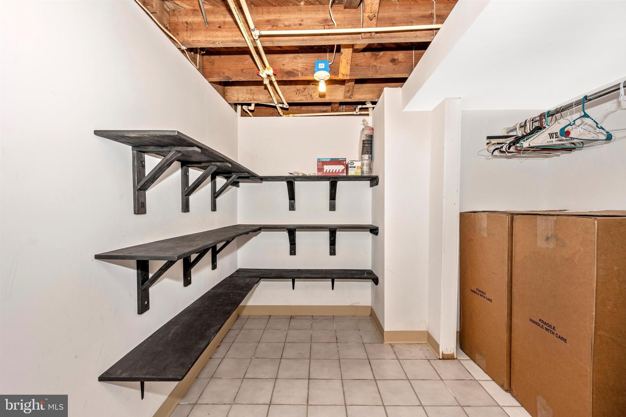 3316 Chapman Road Randallstown, MD 21133 - Photo 28 of 60 Huge Walk-in Storage Area in Basement