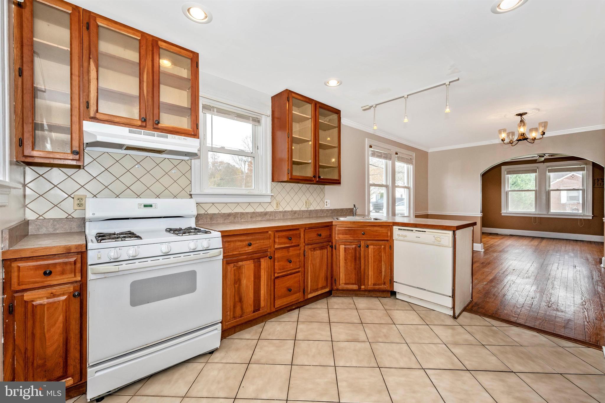3316 Chapman Road Randallstown, MD 21133 - Photo 5 of 60 Open Kitchen with Glass & Cherry Cabinets