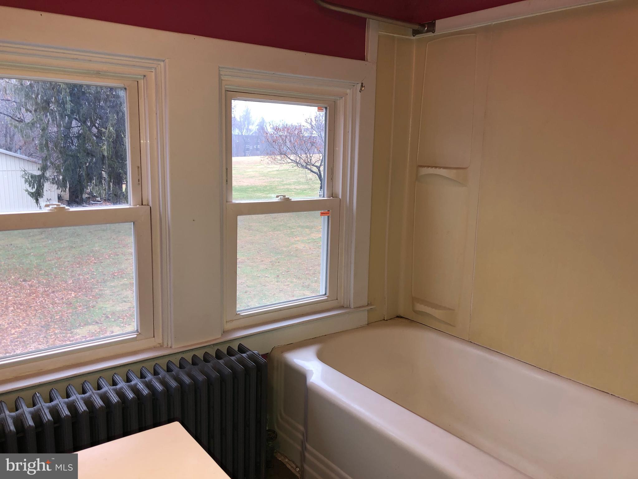 3316 Chapman Road Randallstown, MD 21133 - Photo 44 of 60 Light Bright Double Windows in Apartment Bathroom