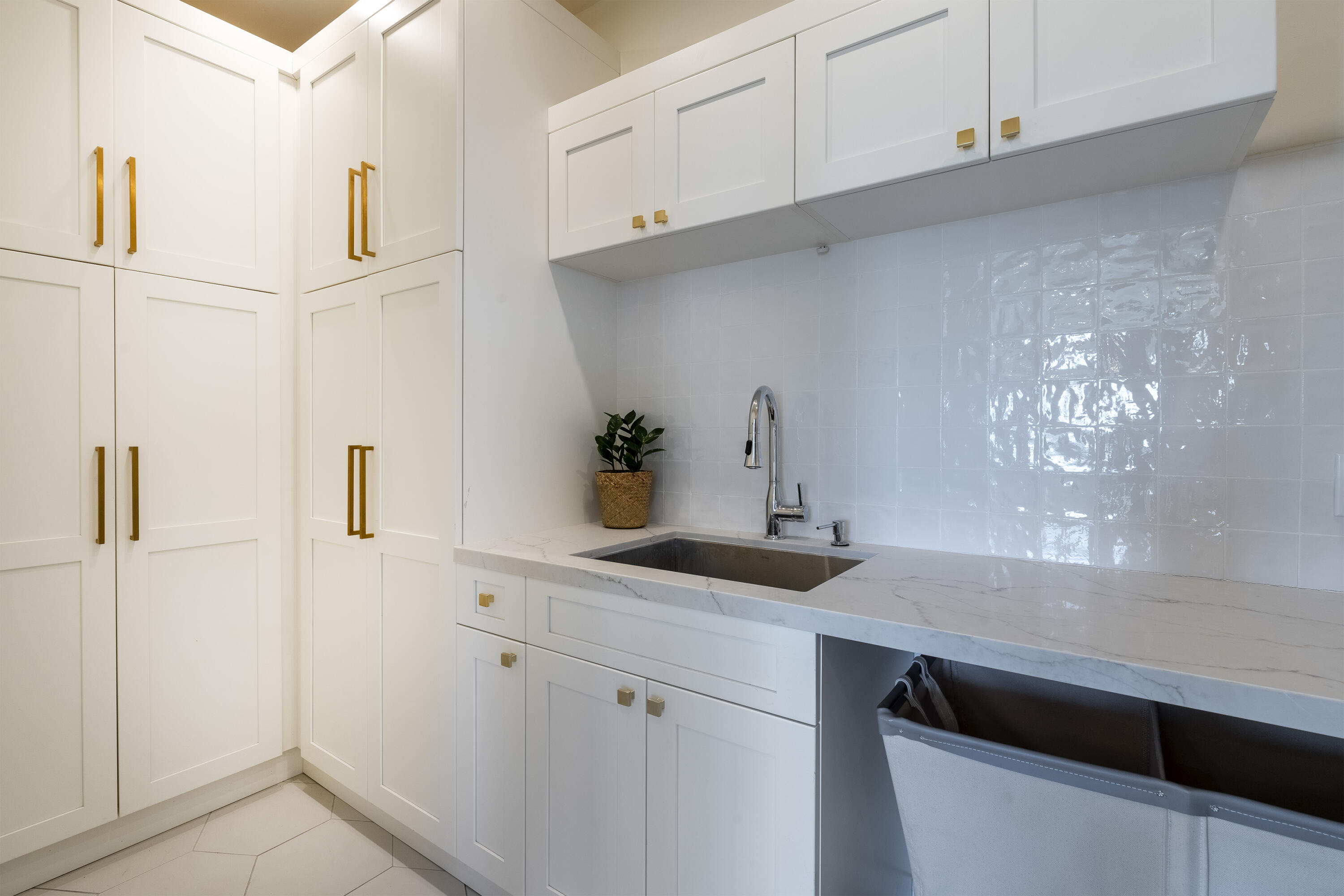 435 Fellowship Road Santa Barbara, CA 93109 - Photo 10 of 38 a kitchen with a sink and cabinets