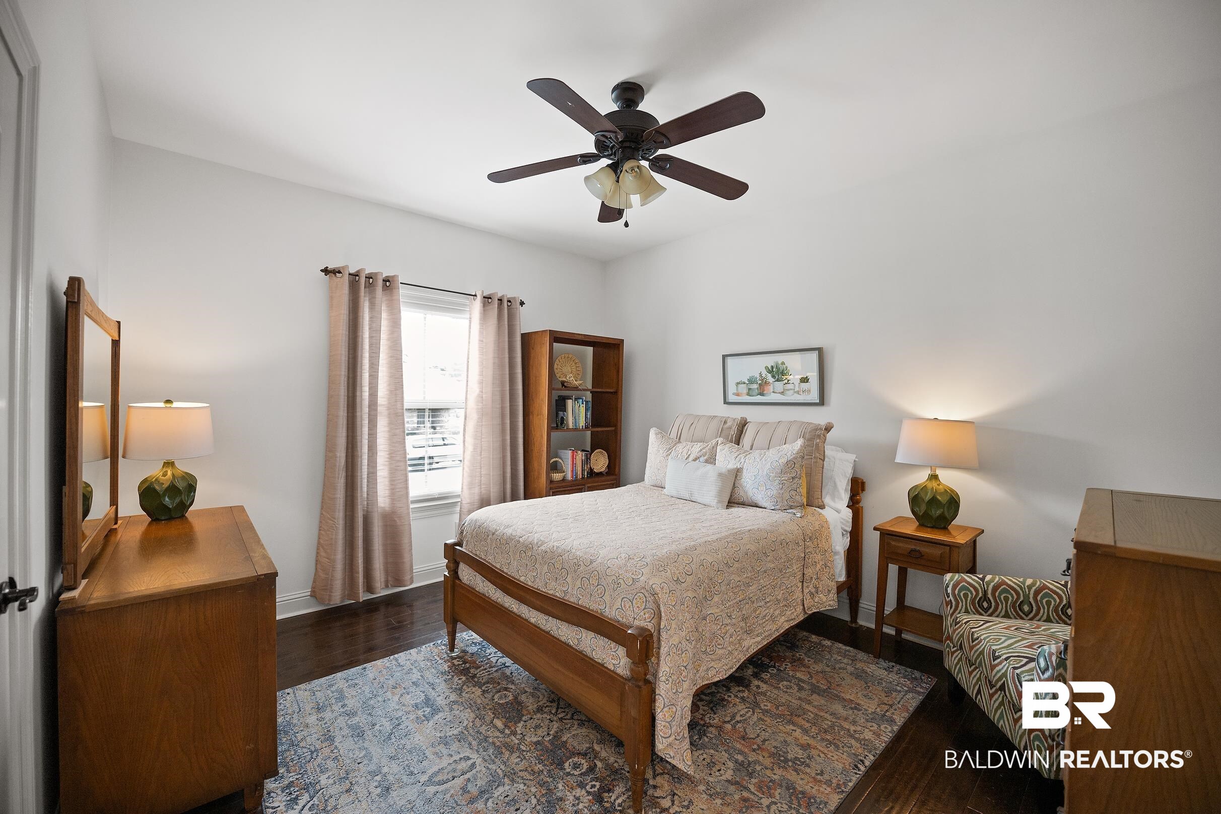 313 Pecan Ridge Boulevard Fairhope, AL 36532 - Photo 21 of 51 Interior room featuring wood-finish flooring, a ceiling fan with integrated lighting, and a window with blinds and drapery