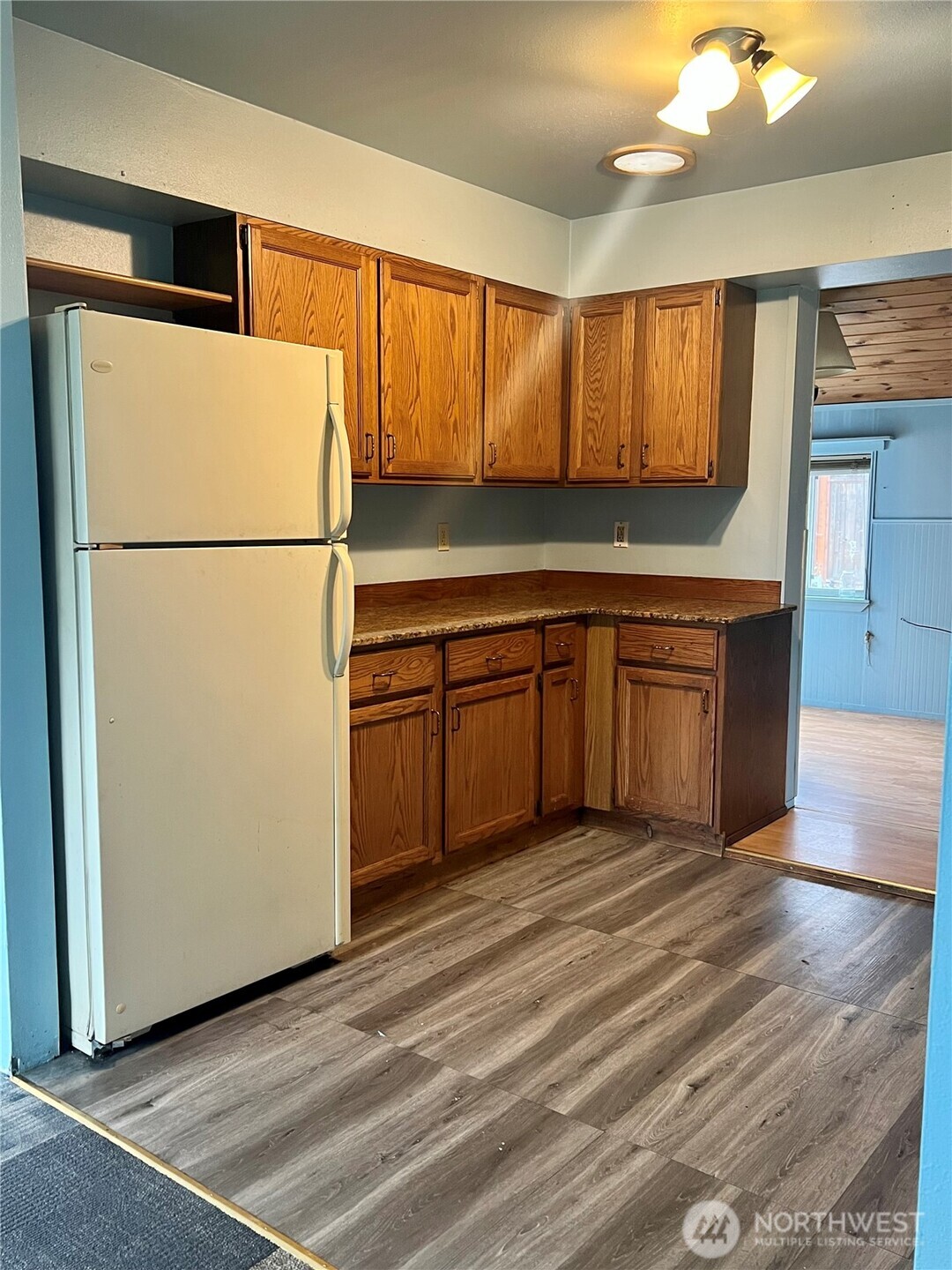 111 Lower Tower Street Riverside, WA 98849 - Photo 14 of 40 a kitchen with stainless steel appliances granite countertop a refrigerator a sink and a more cabinets