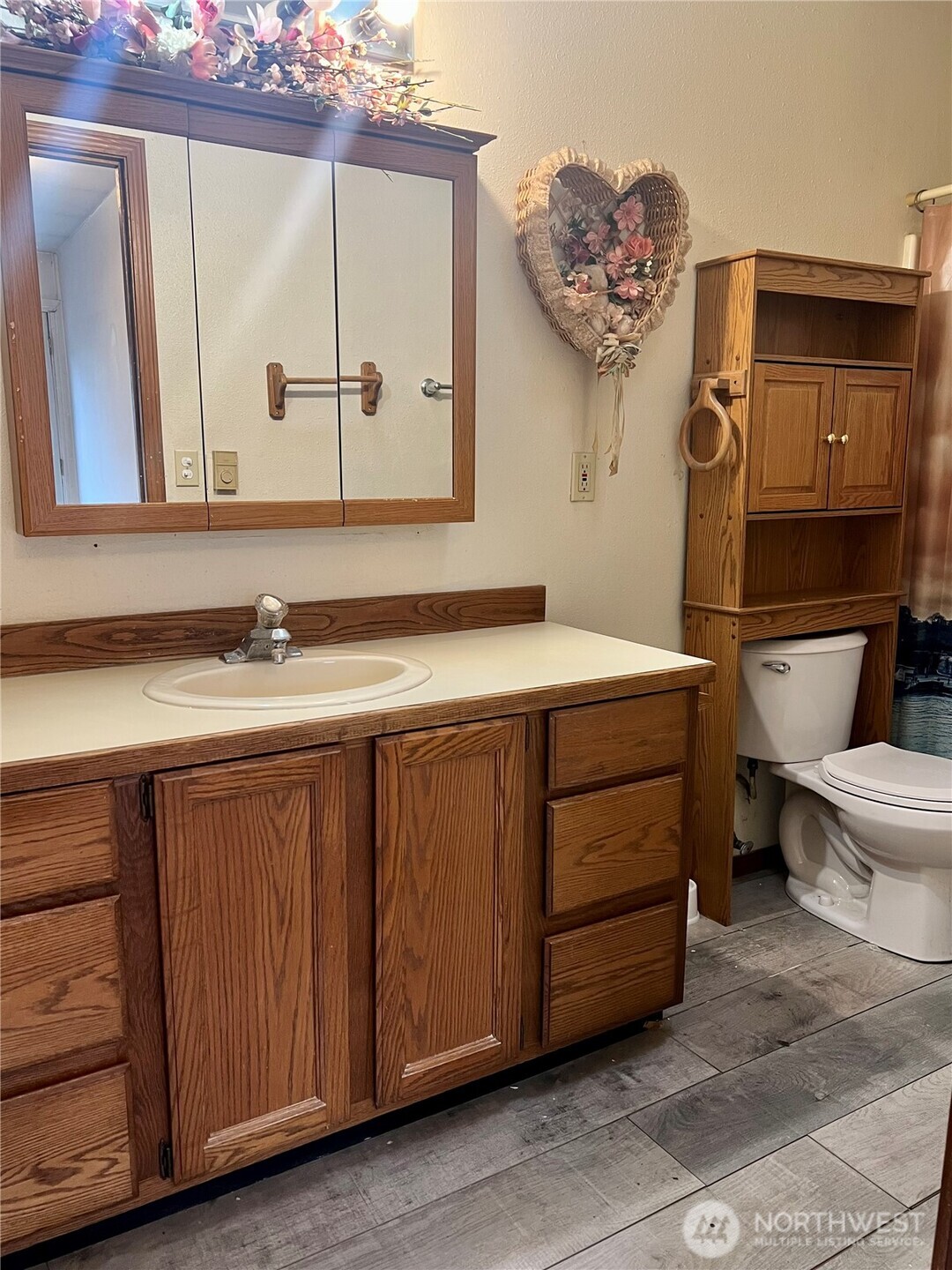 111 Lower Tower Street Riverside, WA 98849 - Photo 22 of 40 a bathroom with a sink and a mirror