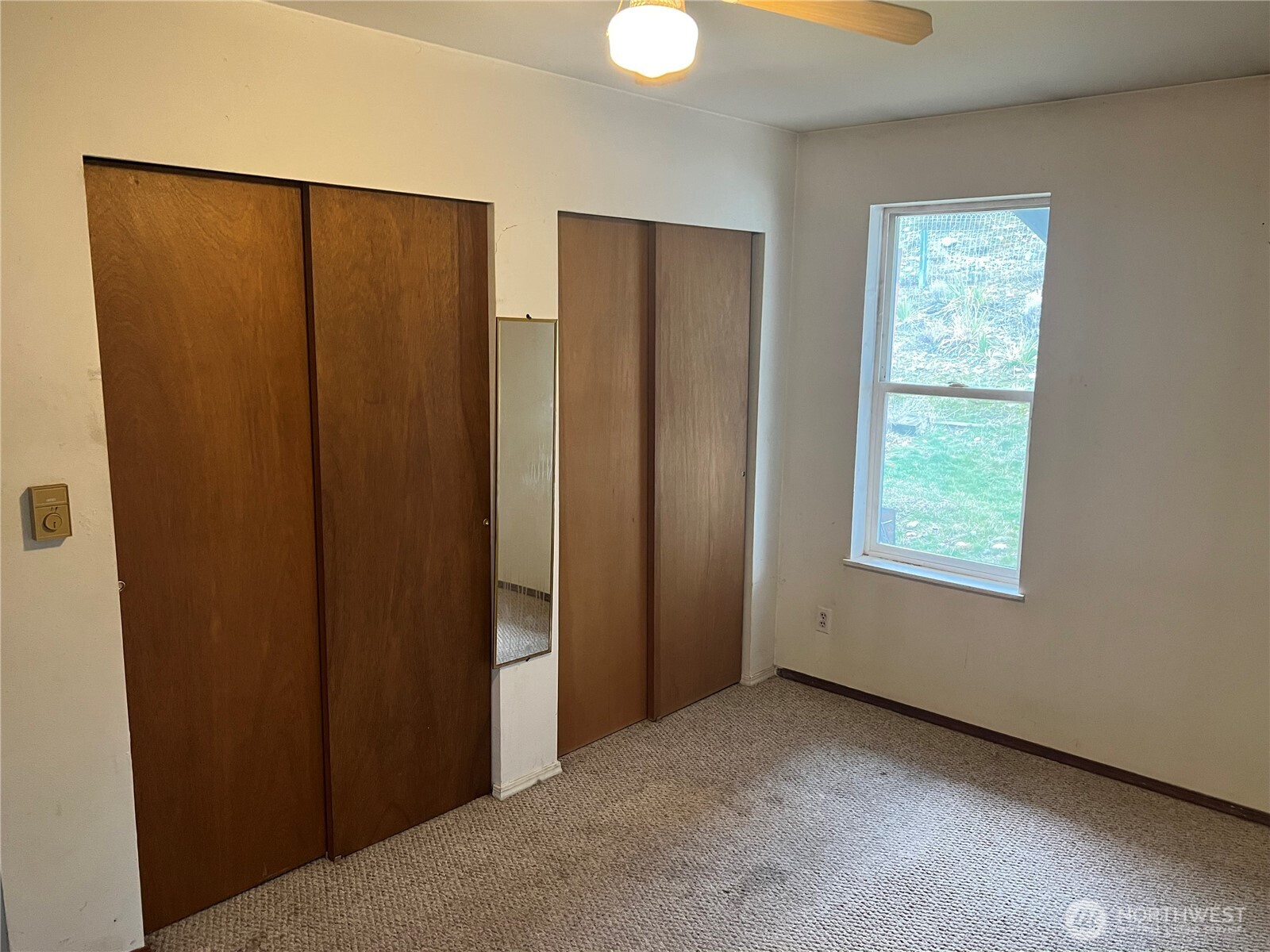 111 Lower Tower Street Riverside, WA 98849 - Photo 23 of 40 an empty room with windows and closet